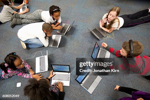 Fourth Grade Students Work On Laptops In Class High-Res Stock Photo ...