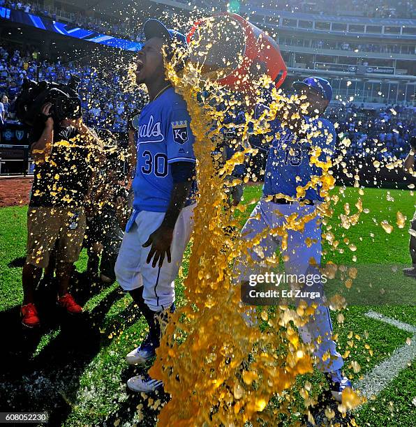 Yordano Ventura of the Kansas City Royals is doused with Gatorade by Salvador Perez after Ventura threw a complete game in the Royals' 8-3 win over...