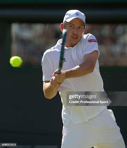 Jan Hajek of the Czech Republic in action during the first round match against Andy Murray of Great Britain on Day Two of the Wimbledon Lawn Tennis...