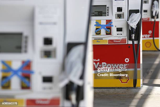 Out of service fuel pumps stand at a Royal Dutch Shell Plc gas station in Spring Hill, Tennessee, U.S., on Monday, Sept. 19, 2016. Customers buying...