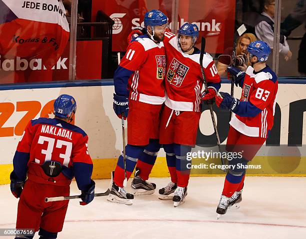 Martin Hanzal of Team Czech Republic celebrates his third period goal with Jakub Nakladal, Ales Hemsky and Roman Cervenka while playing Team Europe...