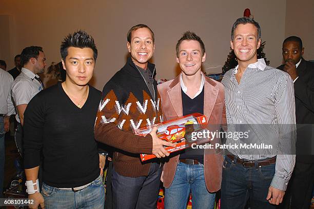 Tsuyoshi Ma, Bryan McCalister, Greg Casto and Brian Gorman attend The 21st Annual TOYS FOR TOTS Sponsored by IMPERIA Vodka, Special Thanks to...