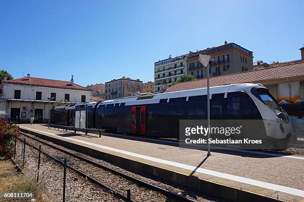 platform and train tracks, station of ajaccio, france - ajaccio stock-fotos und bilder