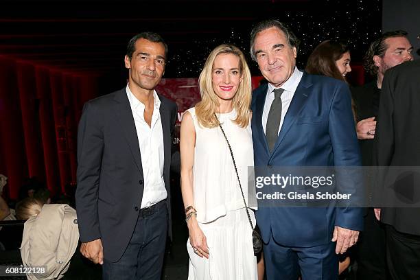 Erol Sander and his wife Caroline Goddet, nice of Oliver Stone during the Europe premiere of the film 'Snowden' at Mathaeser Filmpalast on September...