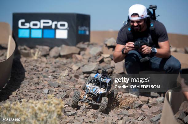 Rafa Ortiz drives a remote controlled car affixed with a GoPro HERO5 Session during a press event in Olympic Valley, California on September 19, 2016.