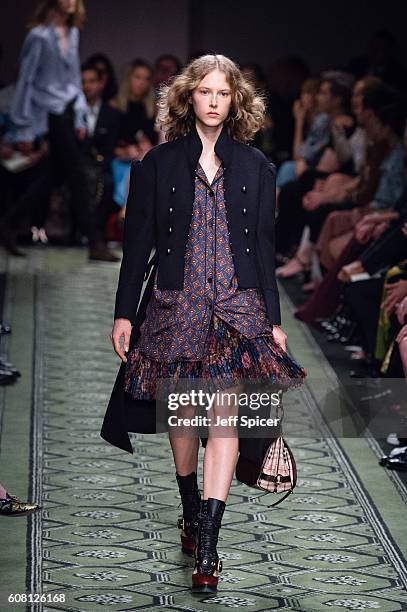 Model walks the runway at the Burberry runway show during London Fashion Week Spring/Summer collections 2017 on September 19, 2016 in London, United...