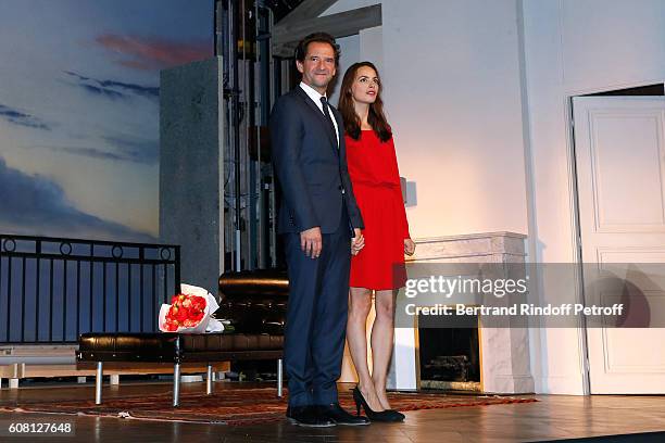 Actors of the play, Stephane De Groodt and Berenice Bejo acknowledge the applause of the audience at the end of the "Tout ce que vous voulez" :...