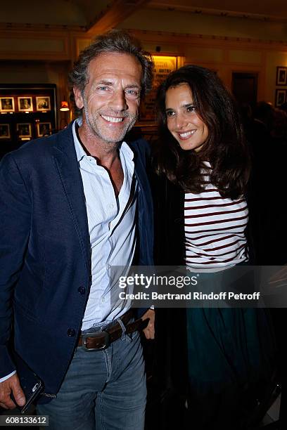 Actor Stephane Freiss and his wife Ursula attend the "Tout ce que vous voulez" : Theater Play at Theatre Edouard VII on September 19, 2016 in Paris,...