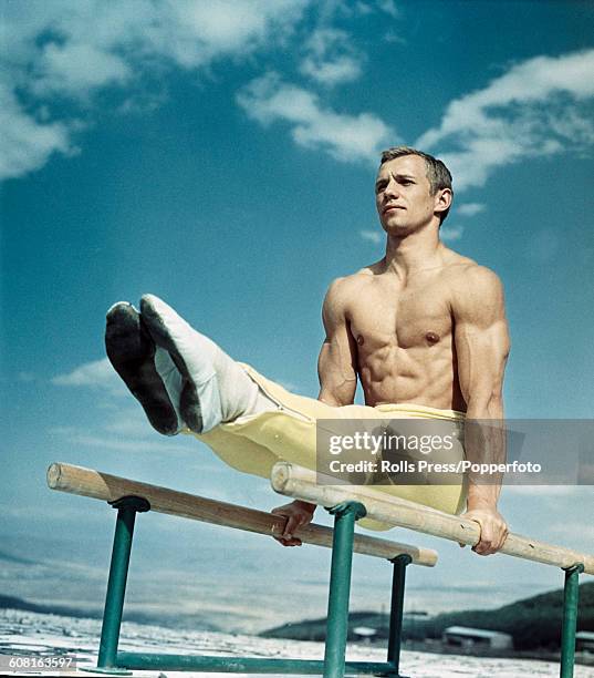 Soviet gymnast Sergey Diomidov pictured training on a set of parallel bars in 1968. Diomidov would go on to represent The Soviet Union in the...