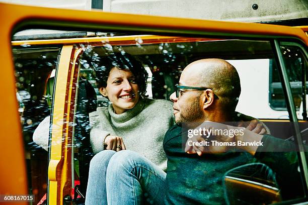 couple sitting together in van after hike - thomas barwick relationship stock pictures, royalty-free photos & images