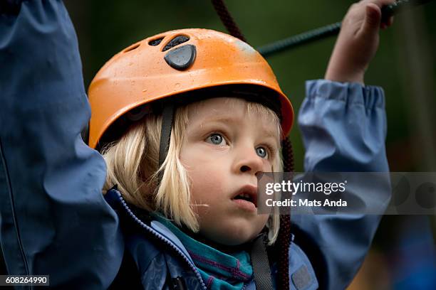 child doing mountain climbing - safety harness military stock pictures, royalty-free photos & images