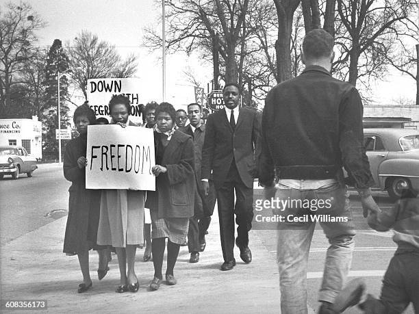 Students from Claflin University and State College demonstrate during a anti-segregation march along a street in downtown Orangeburg, South Carolina,...