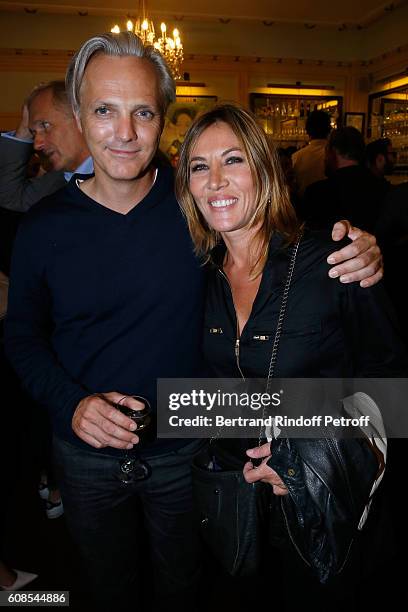 Actress Mathilde Seigner with her companion Mathieu Petit attend the "Tout ce que vous voulez" : Theater Play at Theatre Edouard VII on September 19,...