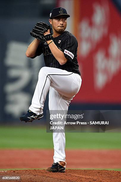 Yuito Mori of Japan pitches during the international friendly match between Japan and Chinese Taipei at the Kyocera Dome Osaka on March 6, 2016 in...