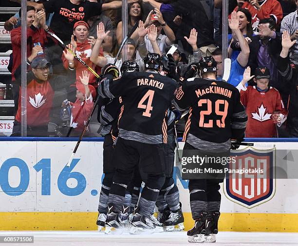 Colton Parayko and Nathan MacKinnon celebrate after Team North America scores a third period goal on Team Russia during the World Cup of Hockey 2016...