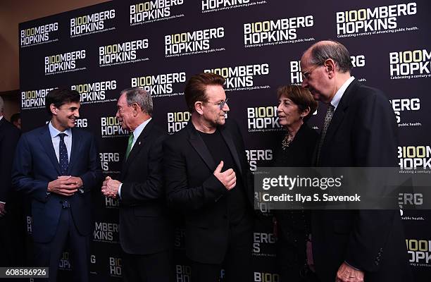 Johns Hopkins University President, Ronald J. Daniels, Michael Bloomberg and Bono attend John Hopkins Bloomberg School Of Public Health Centennial...