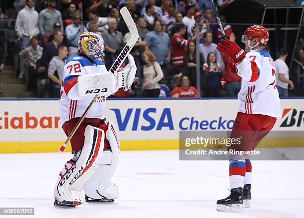 Sergei Bobrovsky and Dmitry Kulikov of Team Russia celebrate after a 4-3 win over Team North America during the World Cup of Hockey 2016 at Air...