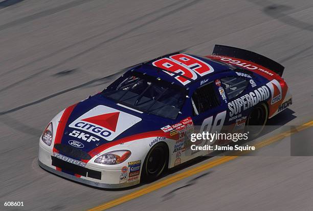 Jeff Burton speeds down the track during the EA Sports 500 , part of the NASCAR Winston Cup Championship Series at Talladega Superspeedway in...