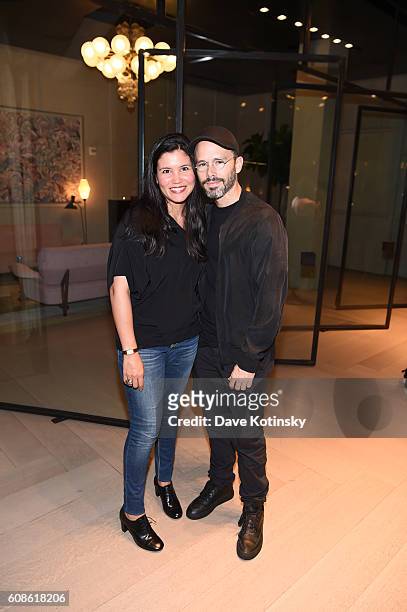 Artist Daniel Arsham and wife attend the Daniel Arsham "Colorblind Artist: In Full Color" at Spring Place on September 19, 2016 in New York City.
