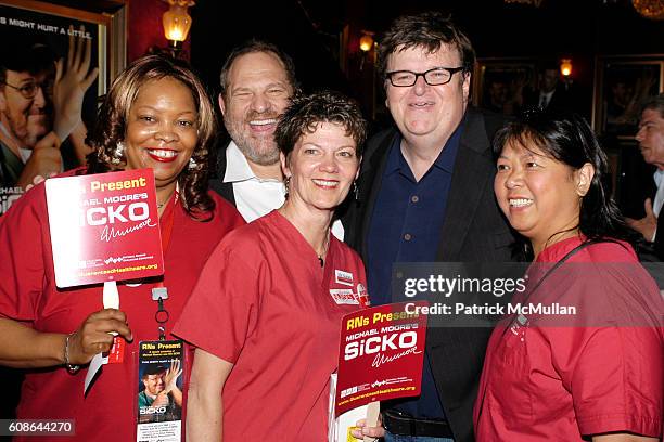 Harvey Weinstein and Michael Moore and members of the New York States Nurses Association attend Bob Weinstein and Harvey Weinstein, The New York...