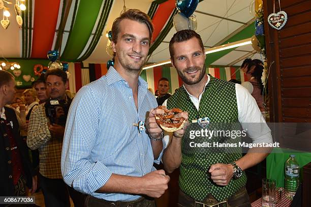 Jens Klingmann and Martin Tomcyzk during the BMW Armbrustschiessen as part of the Oktoberfest 2016 at Armbrust-Schuetzenfesthalle on September 19,...