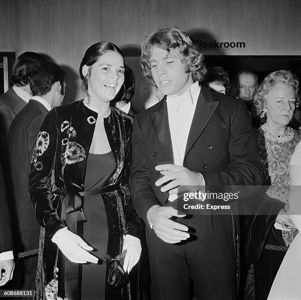 Actors Ali MacGraw and Ryan O'Neal at the premiere of the film 'Love Story' at the Odeon Leicester Square, London, 8th March 1971. They play the two...