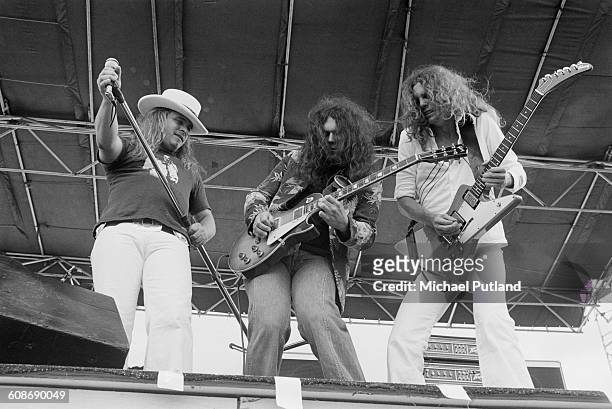 American southern rock group, Lynyrd Skynyrd, performing at John F. Kennedy Stadium, Philadelphia, USA, 11th June 1977. Left to right: Ronnie Van...