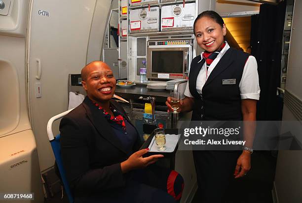 Vanessa Daobry of the Paralympics GB Team dresses in British Airways cabin crew uniform to serve drinks onboard the British Airways flight BA2016...