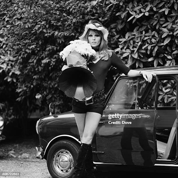 English actress Joanna Lumley with a gramophone she bought in an antique shop, UK, 24th September 1971.