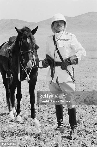 English actor John Mills filming the biopic 'Young Winston' on location in Morocco, 23rd September 1971. He plays General Kitchener in the film.