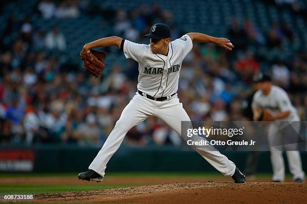 Relief pitcher Pat Venditte of the Seattle Mariners pitches against the Los Angeles Angels of Anaheim at Safeco Field on September 3, 2016 in...