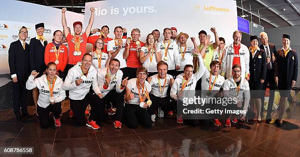 The German paralympic team celebrates after returning from the 2016 Rio Paralympic games at the International Airport Frankfurt on September 20, 2016...
