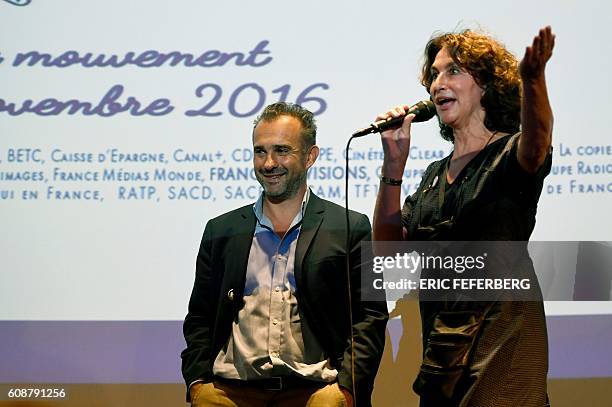 French producer Fabienne Servan-Schreiber speaks as French philosopher Abdennour Bidar listens during the launching of a citizens movement called...