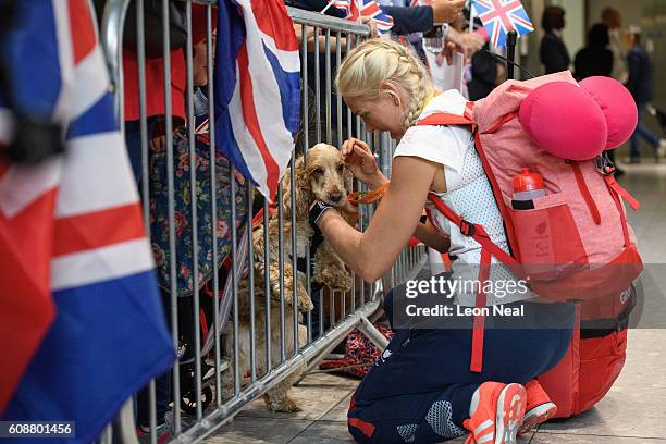 Gold medallist Pamela Relph poses is greeted after arriving on British Airways flight BA2016 from Rio de Janeiro to London Heathrow Terminal 5 on...