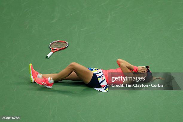 Open - Day 13 Angelique Kerber of Germany falls to the ground in celebration after winning the Women's Singles Final against Karolina Pliskova of the...