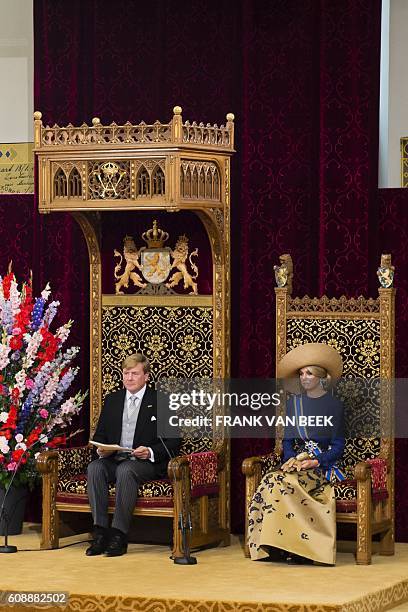 Dutch King Willem-Alexander delivers a speech from the throne next to Queen Maxima sitting in the Ridderzaal during the 'Prinsjesdag' in The Hague on...