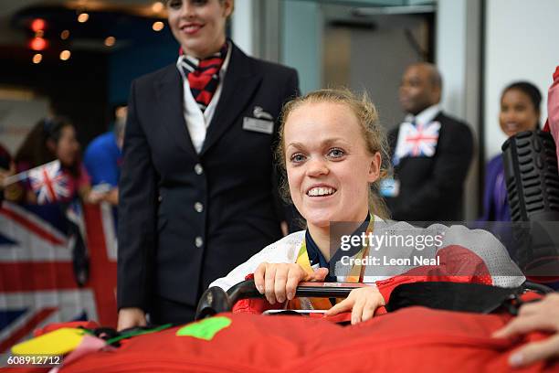 Gold medallist Ellie Simmonds is greeted by supporters after arriving on British Airways flight BA2016 from Rio de Janeiro to London Heathrow...