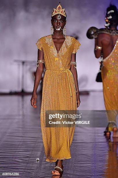 Model walks the runway at the Ashish show during London Fashion Week Spring/Summer collections 2016/2017 on September 19, 2016 in London, United...