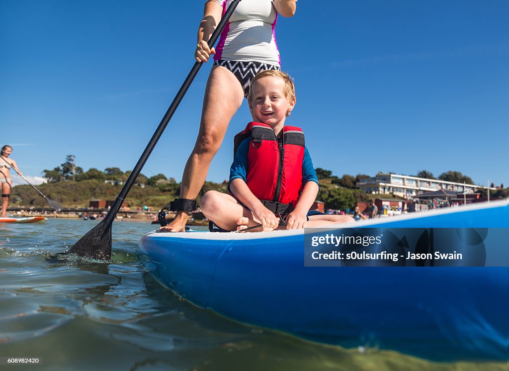 Family Stand Up Paddleboarding on the Isle of Wight.