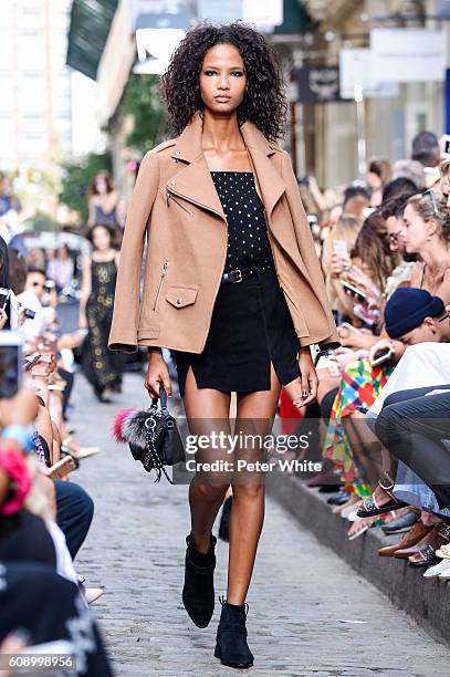 Model walks the runway at the Rebecca Minkoff fashion show during New York Fashion Week at on September 10, 2016 in New York City.