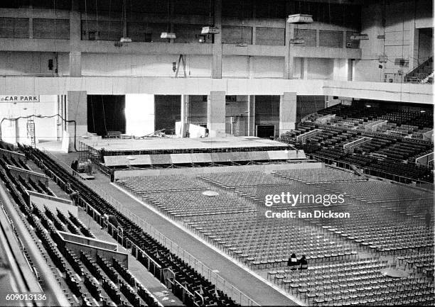 Preparing the empty auditorium at Earls Court for a run of Led Zeppelin concerts, London, May 1975.