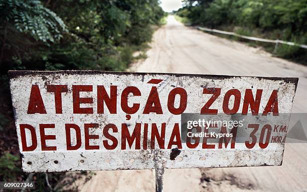 africa, southern africa, mozambique, view of mine field (portuguese warning sign) (year 2000) - mozambique war stock pictures, royalty-free photos & images