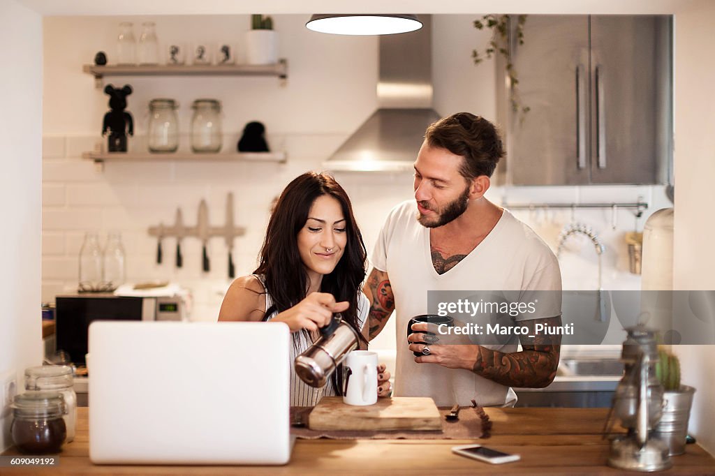Young couple at home - Morning breakfast time