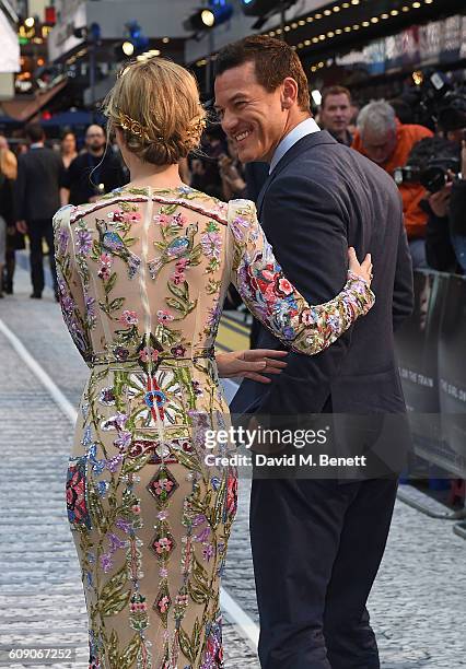 Emily Bunt and Luke Evans attend the World Premiere of "The Girl On The Train" at Odeon Leicester Square on September 20, 2016 in London, England.