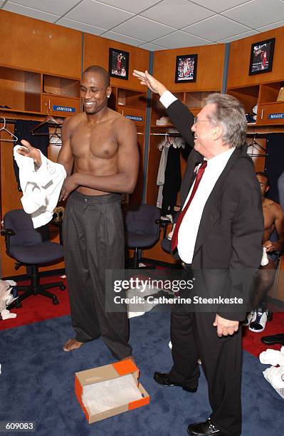 Clippers owner Donald Sterling has a laugh with Elton Brand after the game versus the Minnesota Timberwolves at Staples Center in Los Angeles,...