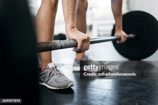 Woman lifting weights Woman lifting weights