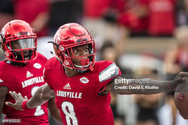 Closeup of Louisville QB Lamar Jackson victorious after rushing for 47-yard touchdown in the fourth quarter vs Florida State at Papa John's Cardinal...