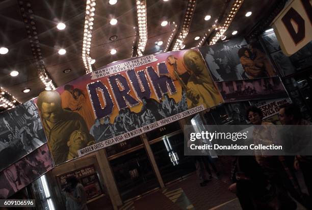View of the front entrance of the New Amsterdam Theatre with the advertising for the film 'Drum' in 1976 in New York City, New York.