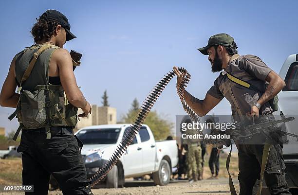 Free Syrian Army members are seen in Taslihoyuk village of Jarabulus as they carry out an operation within the "Operation Euphrates Shield" led by...
