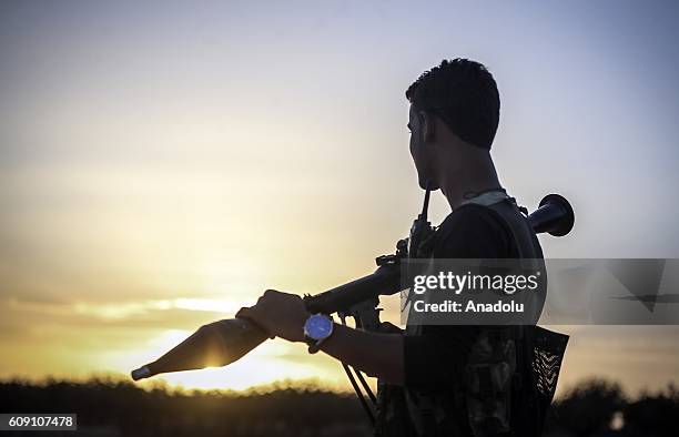 Free Syrian Army member is seen in Taslihoyuk village of Jarabulus as they carry out an operation within the "Operation Euphrates Shield" led by...